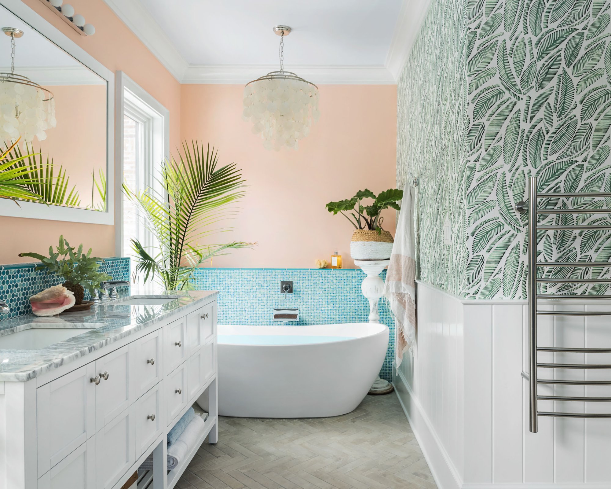 Freestanding tub with turquoise glass mosaic tile surround and capiz chandelier — Tropical Master Bath, Hunt Valley